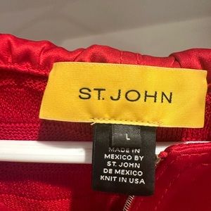 St. John Small woman’s sweater with hood.